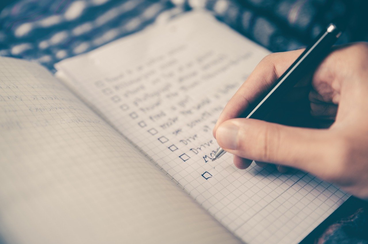 Feuille papier avec checklist objectifs Feuille papier avec checklist objectifs